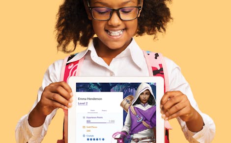 Smiling student holing tablet with screenshot of her Classcraft avatar